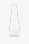 A chic white rectangular shoulder bag, reminiscent of Victoria Beckham's minimalist style, featuring a long, thin, removable strap. This Victoria Beckham Mini Chain Pouch Bag With Long Strap In White Leather is elegantly displayed against a plain white background.