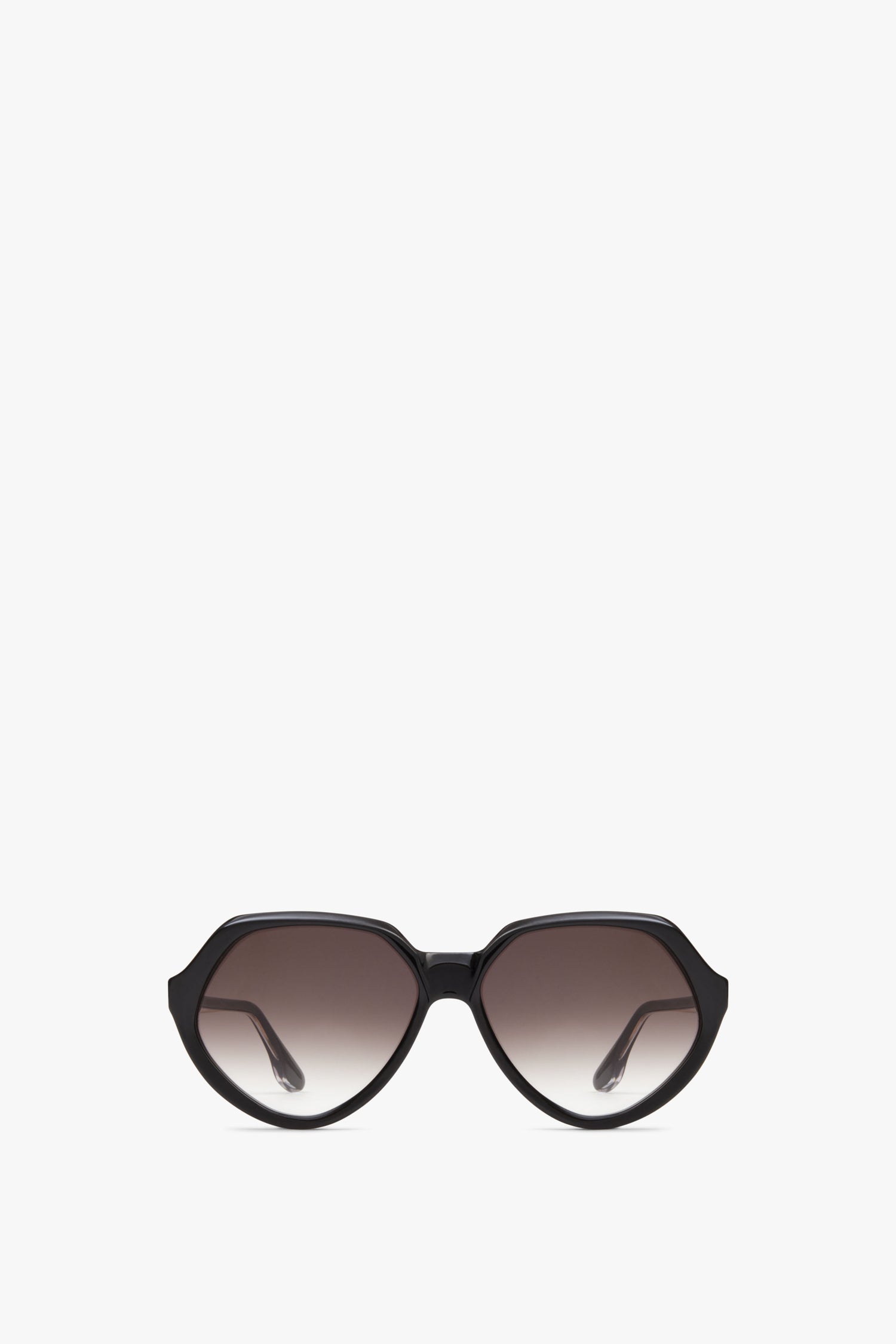 A pair of Victoria Beckham Faceted Round In Black sunglasses is centered against a white background.